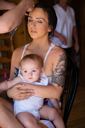 Bride and baby girl getting ready photos